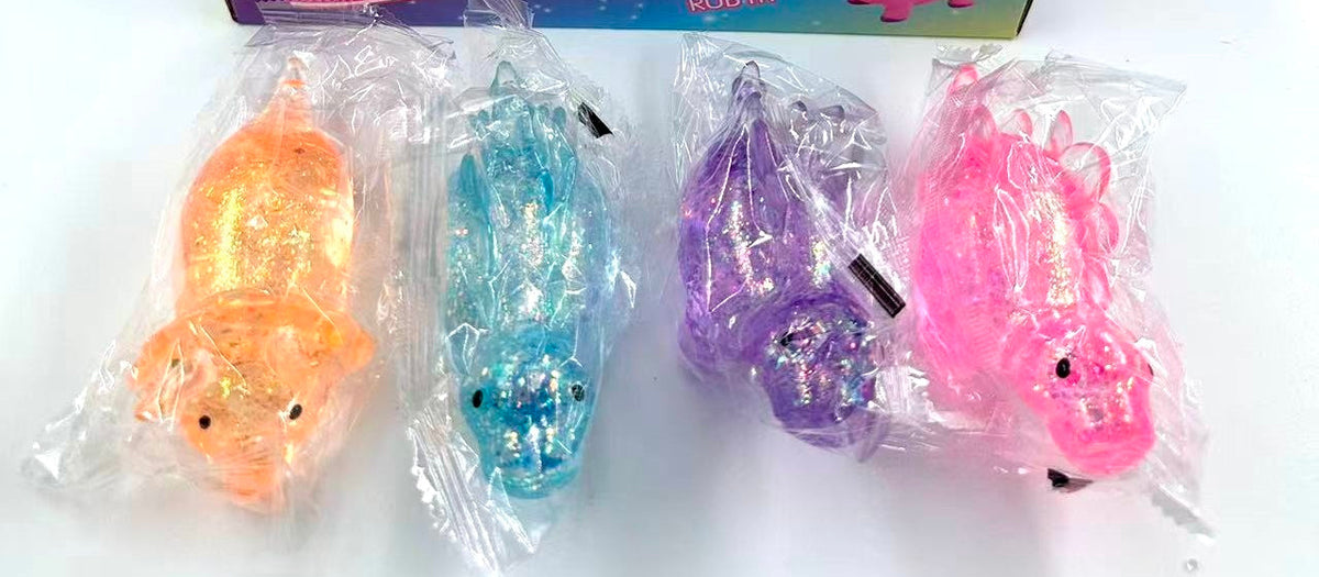 Stretchy glitter dinosaur squishy toys in orange, blue, purple and pink