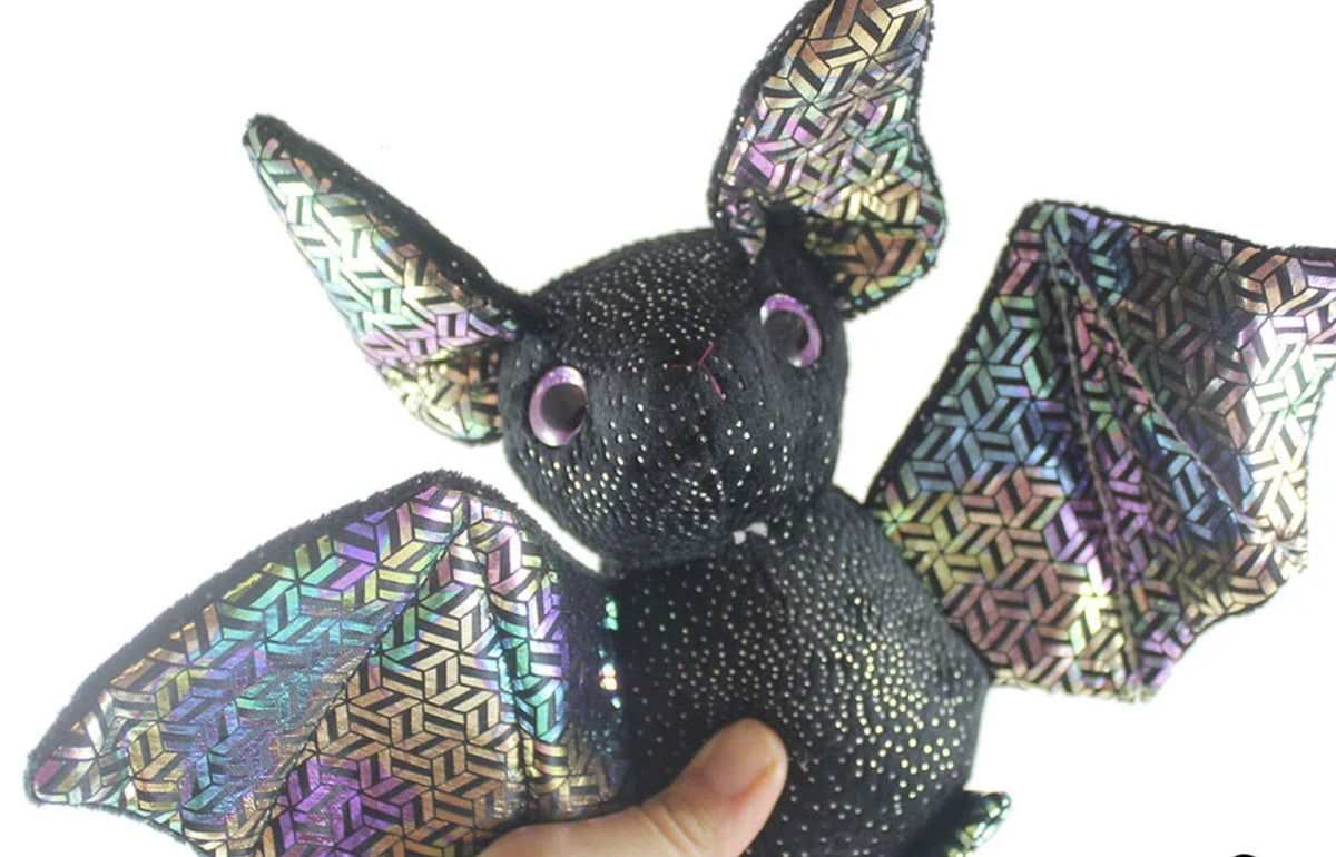 Black iridescent bat plush with shimmering wings