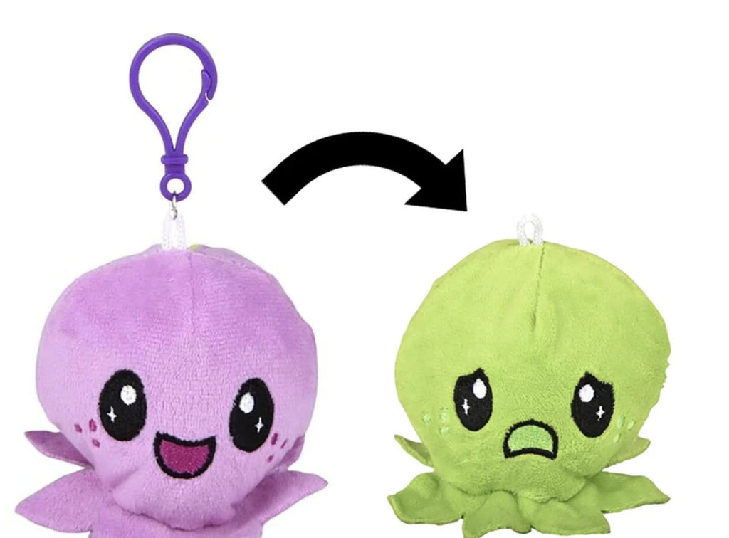 Reversible octopus plush flipping from happy to sad
