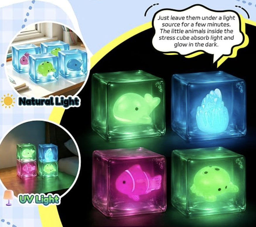 Sea animal squishy cubes glowing in the dark after time under a light